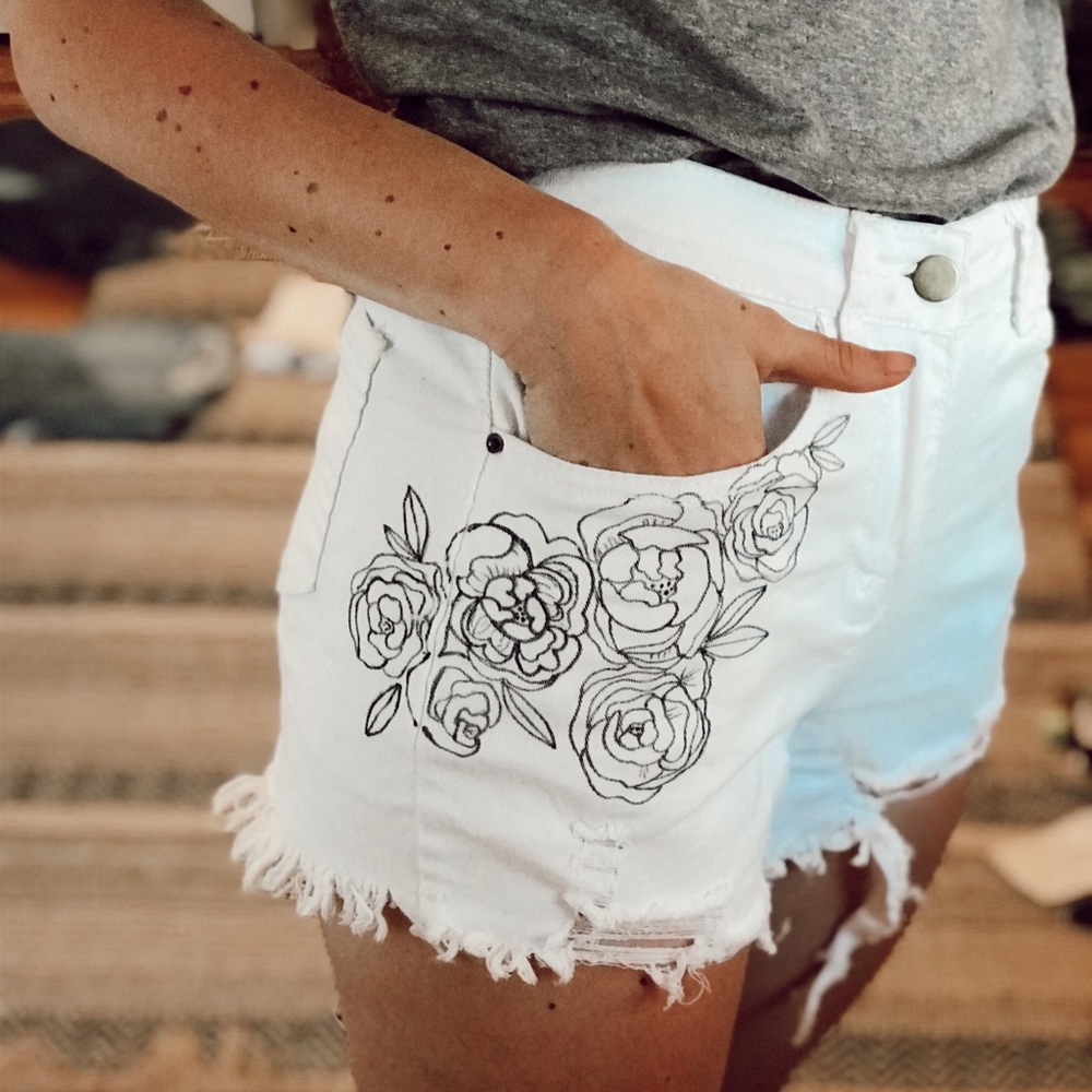 Hand painted white denim shorts